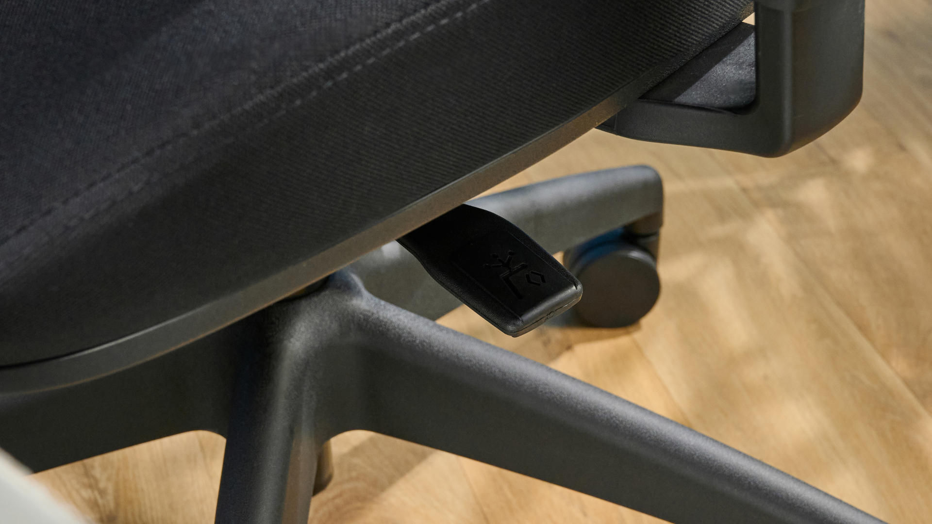 A black Boulies OP300 ergonomic office chair