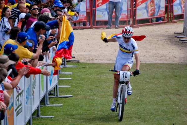 The final Colombian rider has time to celebrate the team relay win