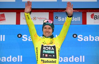 KANBO FRANCE APRIL 02 Primoz Roglic of Slovenia and Team BORA hansgrohe Yellow Leader Jersey celebrates at podium during the 63rd Itzulia Basque Country 2024 Stage 2 a 160km stage from Irun to Kanbo UCIWWT on April 02 2024 in Kanbo France Photo by Tim de WaeleGetty Images