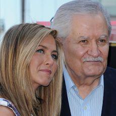 US actress Jennifer Aniston (L) stands for a photo with her father, Greek-US actor John Aniston, during her Hollywood Walk of Fame star ceremony in Hollywood, California, on February 22, 2012