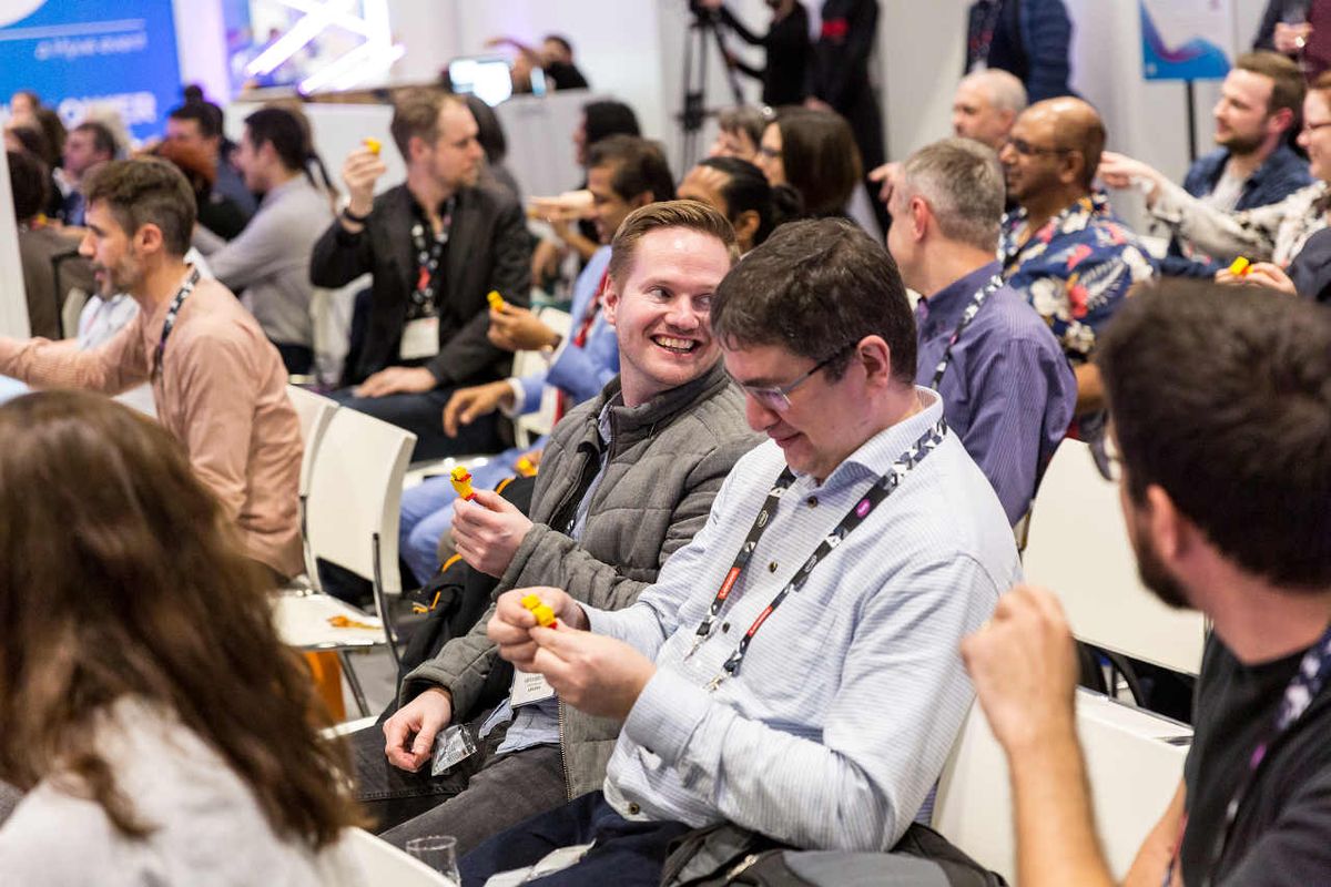 Bett attendees play with educational toys