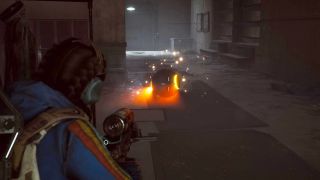 Arc Raiders Fireballs: A player shooting at a Fireball that's charging towards them inside a dark hallway.