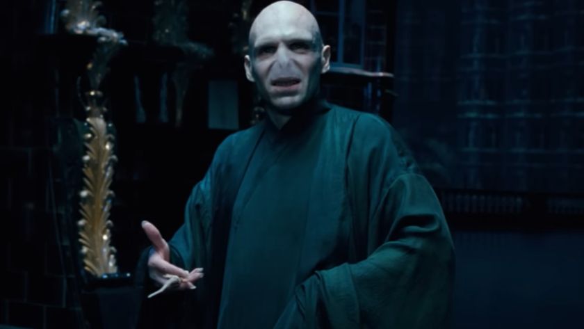 Ralph Fiennes as Voldemort in Order of the Phoenix, holding his wand in his left hand. 