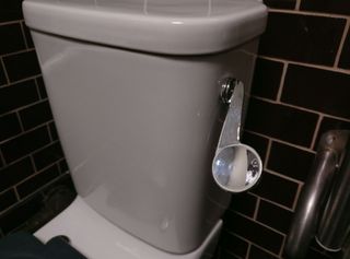 Toilet with hand flush