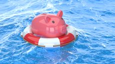 A piggy bank balanced on a lifesaver in rough blue water.