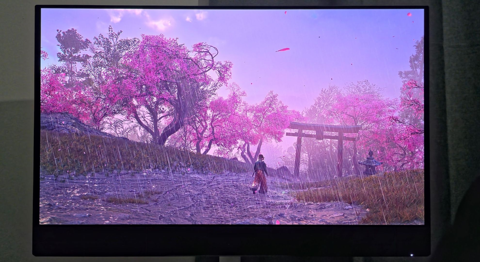 The Dell S3225QC displaying Assassin's Creed Shadows