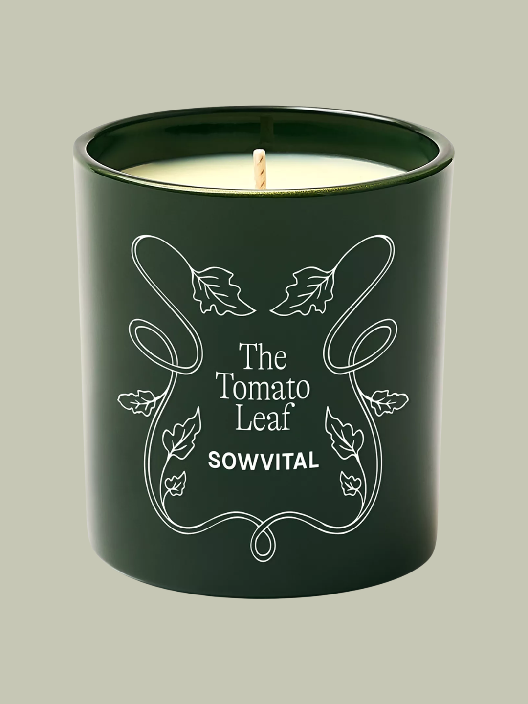 A green, tomato leaf-scented candle from Sowvital