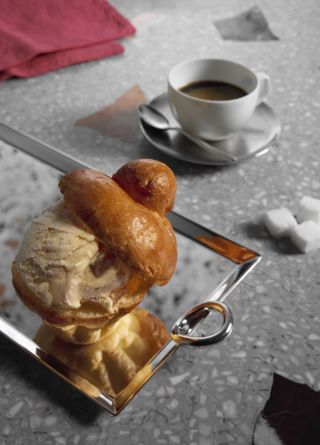gelato in glass cup with brioche on top