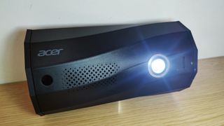 Acer C250i review: portable projector lying on its side
