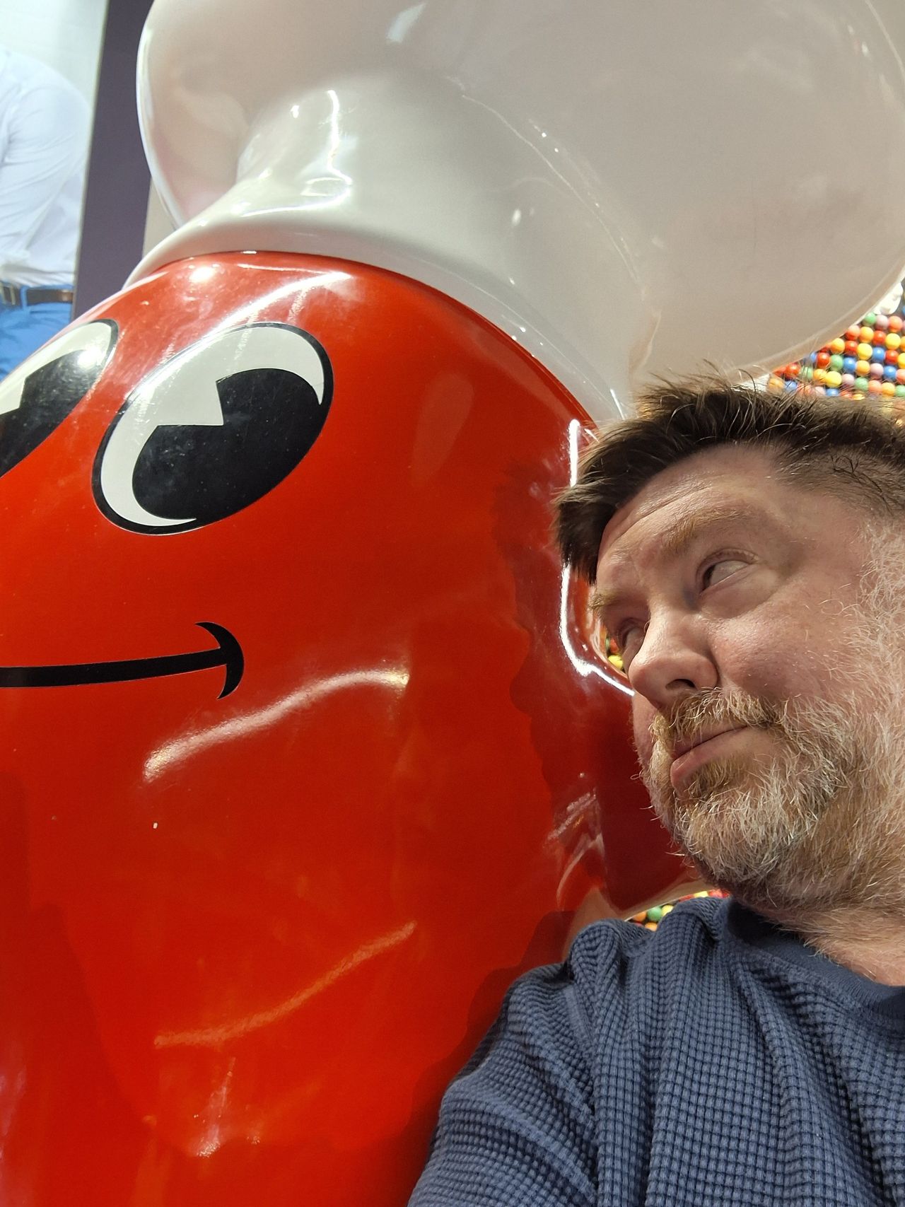 Selfie taken with a Jelly Belly mascot by a Galaxy A35