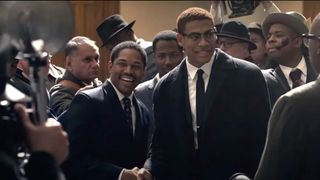 Kelvin Harrison Jr and Aaron Pierre as Dr. Martin Luther King Jr. and Malcolm X shaking hands in Genius: MLK/X