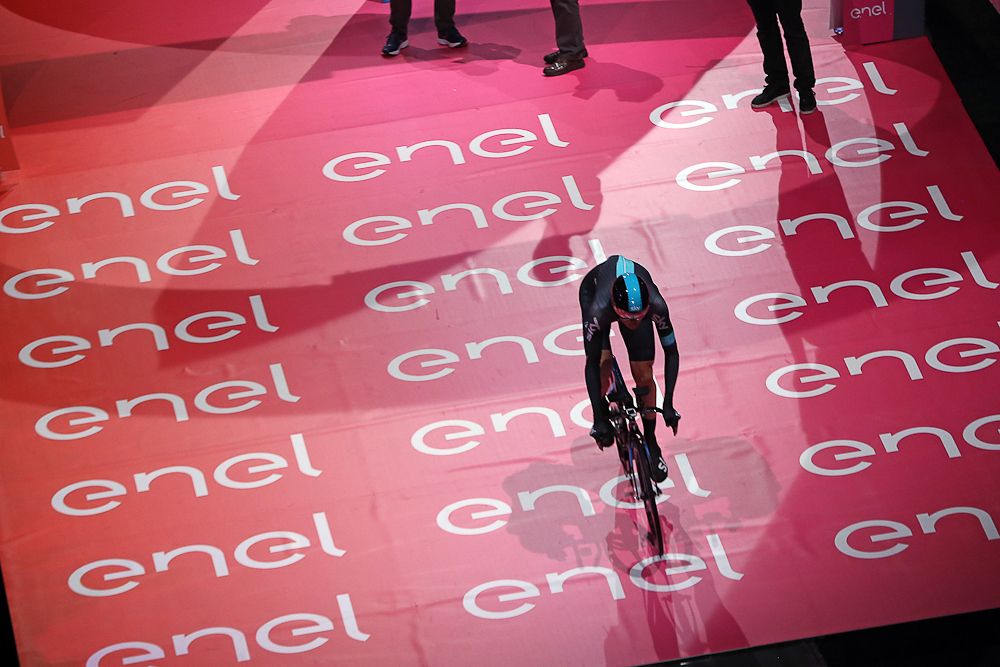 A rider from Team Sky exits the starting ramp inside the Apeldoorn Omnisport centre.