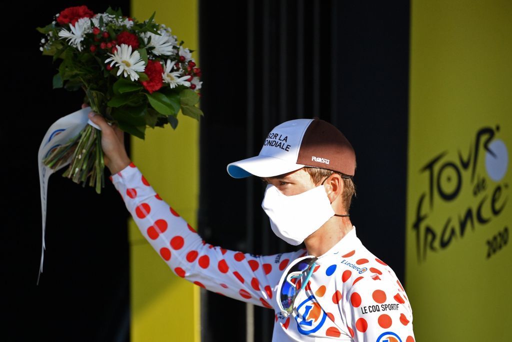 Team AG2R La Mondiale rider Frances Benoit Cosnefroy celebrates his best climbers polka dot jersey on the podium at the end of the 5th stage of the 107th edition of the Tour de France cycling race 185 km between Gap and Privas on September 2 2020 Photo by AnneChristine POUJOULAT various sources AFP Photo by ANNECHRISTINE POUJOULATAFP via Getty Images