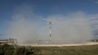 The first stage of a SpaceX Falcon 9 rocket makes its fifth landing at the company's Landing Zone 1 at Cape Canaveral Space Force Station in Florida after launching the clandestine NROL-108 spy satellite for the National Reconnaissance Office on Dec. 19, 2020.