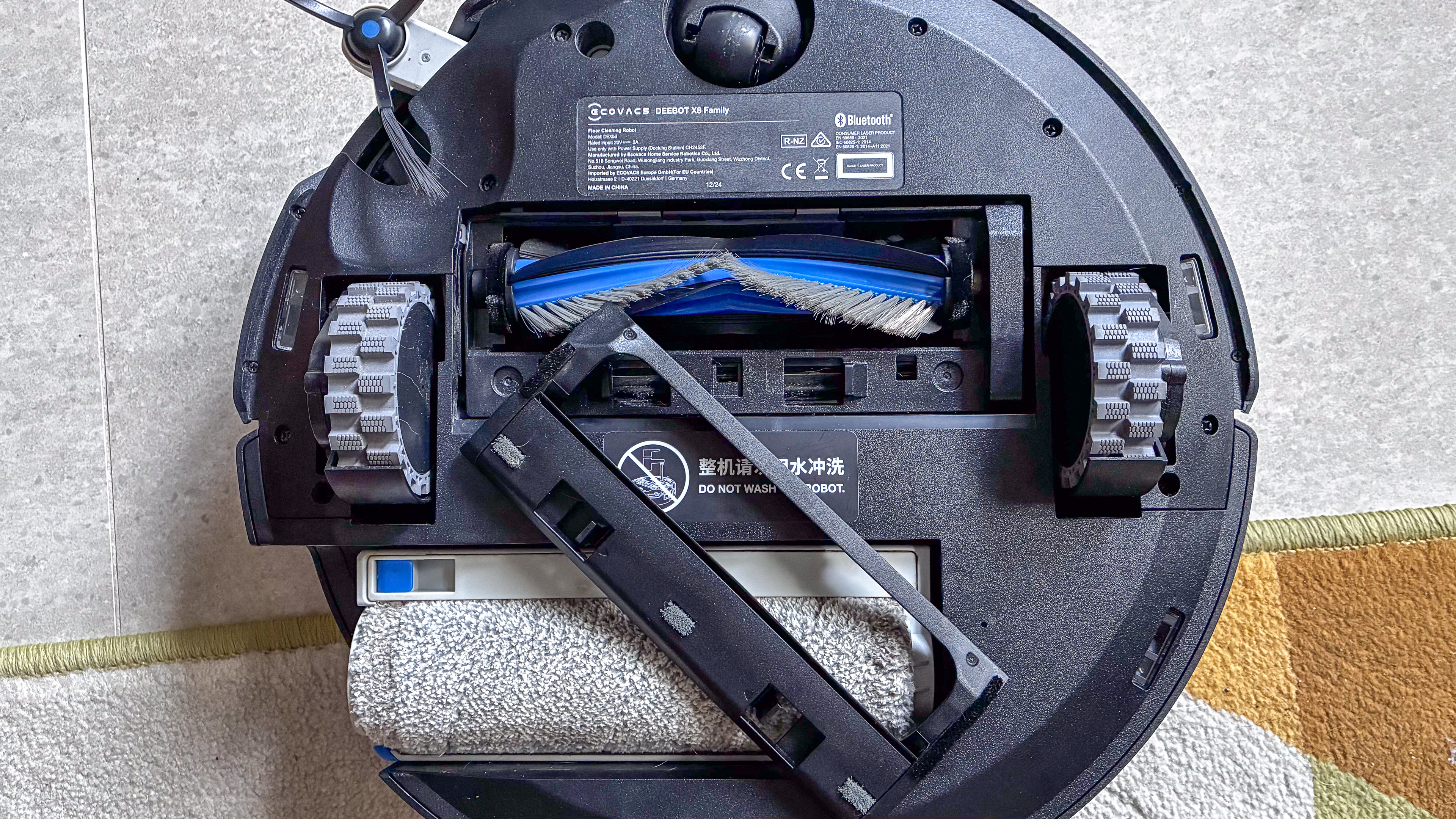 The underside of the Ecovacs Deebot X8 Pro Omni robot vacuum