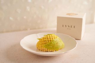 Lysée New York Pastry show small cake made to look like corn on the cob