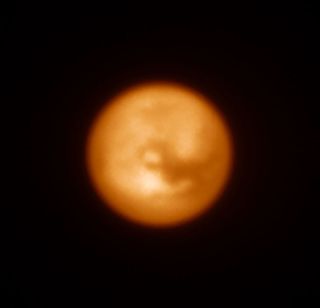 This infrared image of Saturn’s largest moon, Titan, was one of the first produced by the SPHERE instrument soon after it was installed on ESO's Very Large Telescope in Chile in May 2014.