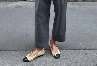 Woman wearing ballet flats.