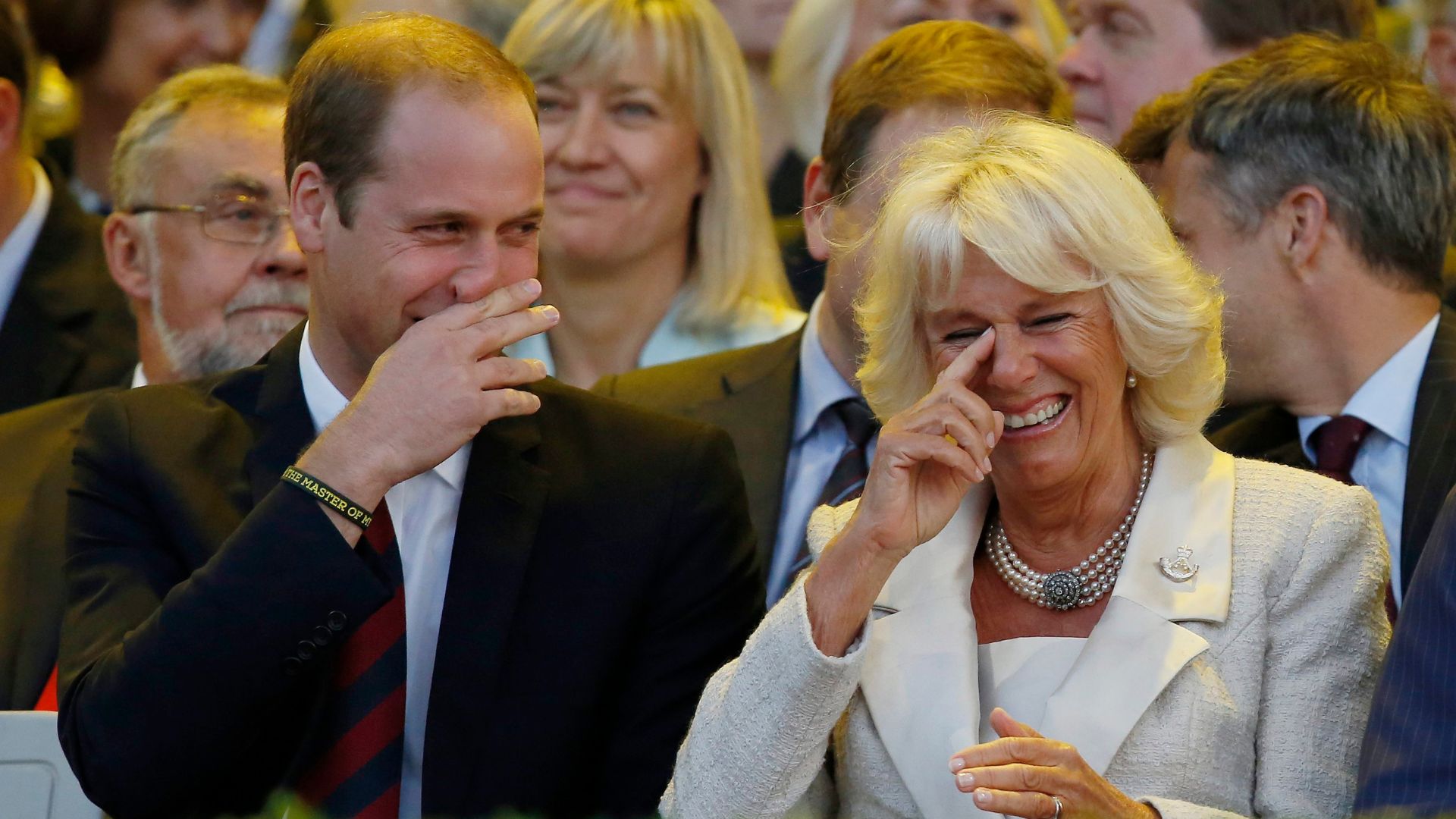 Prince William and Queen Camilla laughing
