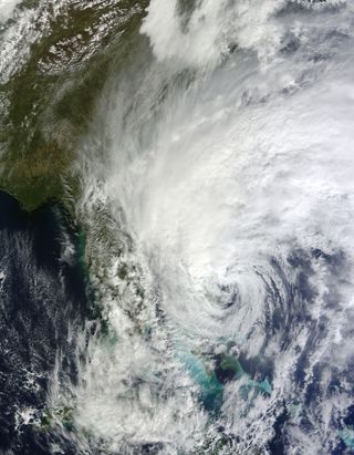 This visible image of Hurricane Sandy shows the massive extent of its clouds, covering about 2,000 miles.