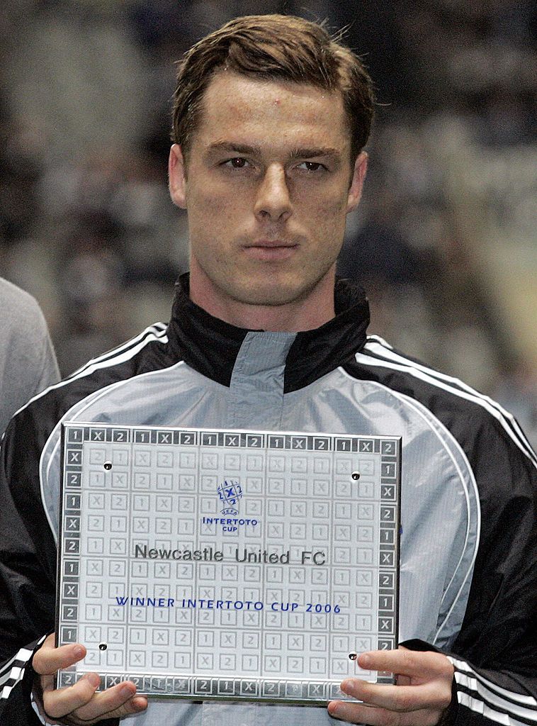 Newcastle's Captain Scott Parker poses with the Intertoto Cup Trophy he received before their UEFA Cup last 16 first leg match at St James' Park, Newcastle, England, 08 March 2007.