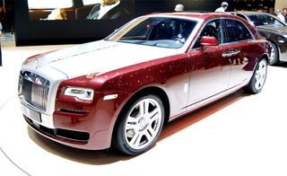 White and red Rolls-Royce Ghost II on display