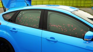 Shapes move around the displays in reaction to your emotions