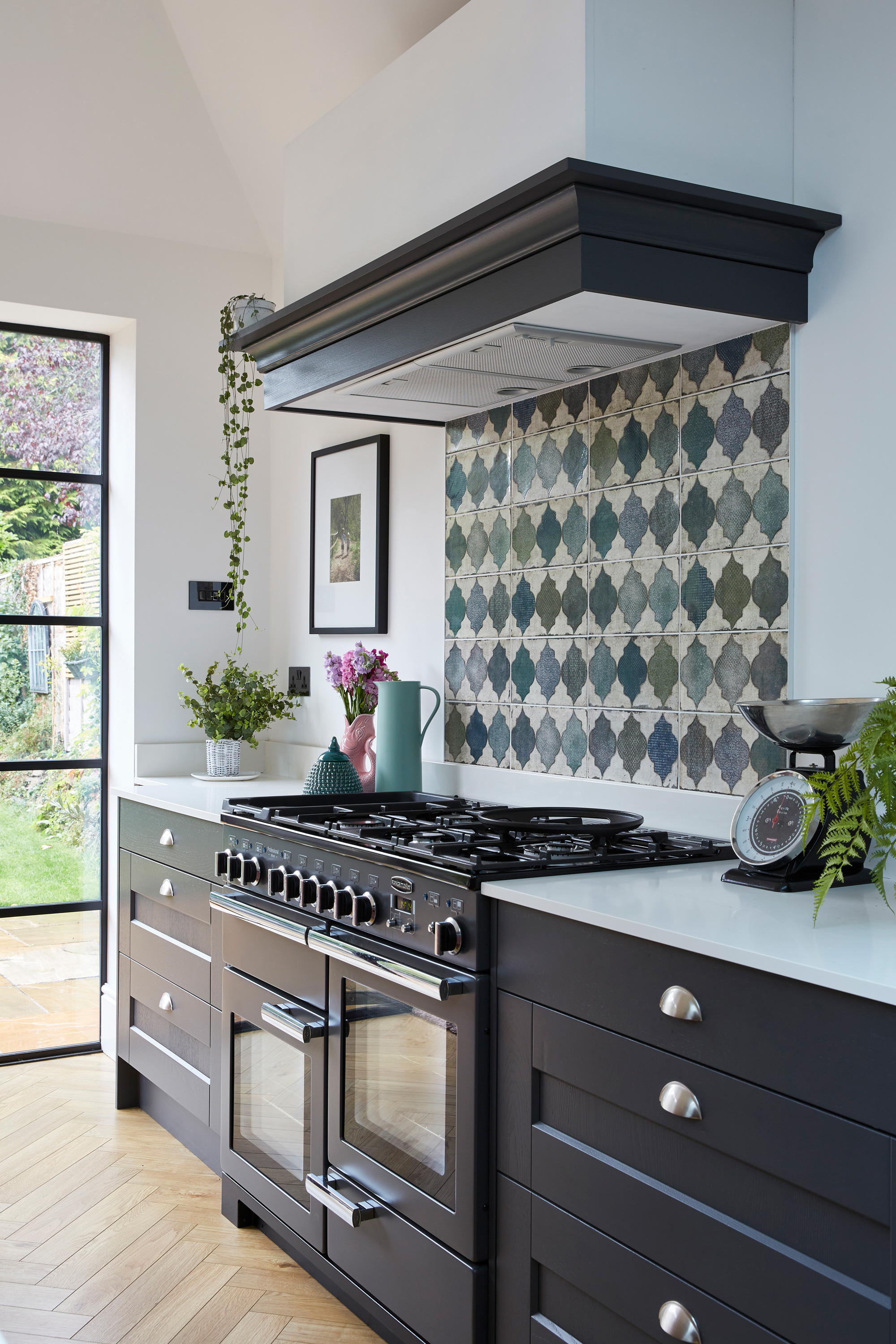 With a colourful twist on a modern design, Lucy Kirwan has created a party-ready kitchen to be proud of