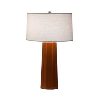 A table lamp with linen shade