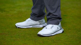 Payntr X-006 Golf Shoes in a white colorway on the golf course