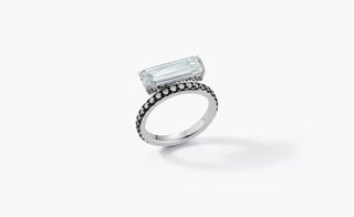 elongated baguette diamond, which appears to float next to a delicate pavé diamond band by Jemma Wynne