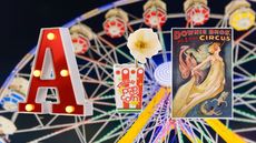 Carnivalcore decor including a marquee letter light in red, a popcorn carton vase, and a vintage carnival poster on a blurry background of a ferris wheel at night