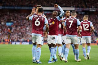 Moussa Diaby of Aston Villa celebrates the team's first goal alongside goal scorer Douglas Luiz during the Premier League match between Aston Villa and West Ham United at Villa Park on October 22, 2023 in Birmingham, England. (Photo by Nathan Stirk/Getty Images)
