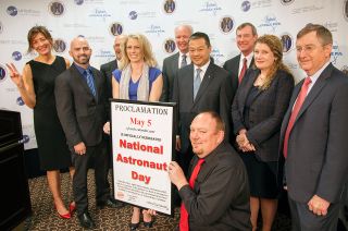Astronauts join Uniphi Space Agency officials and representatives of Fisher Space Pen to announce National Astronaut Day.