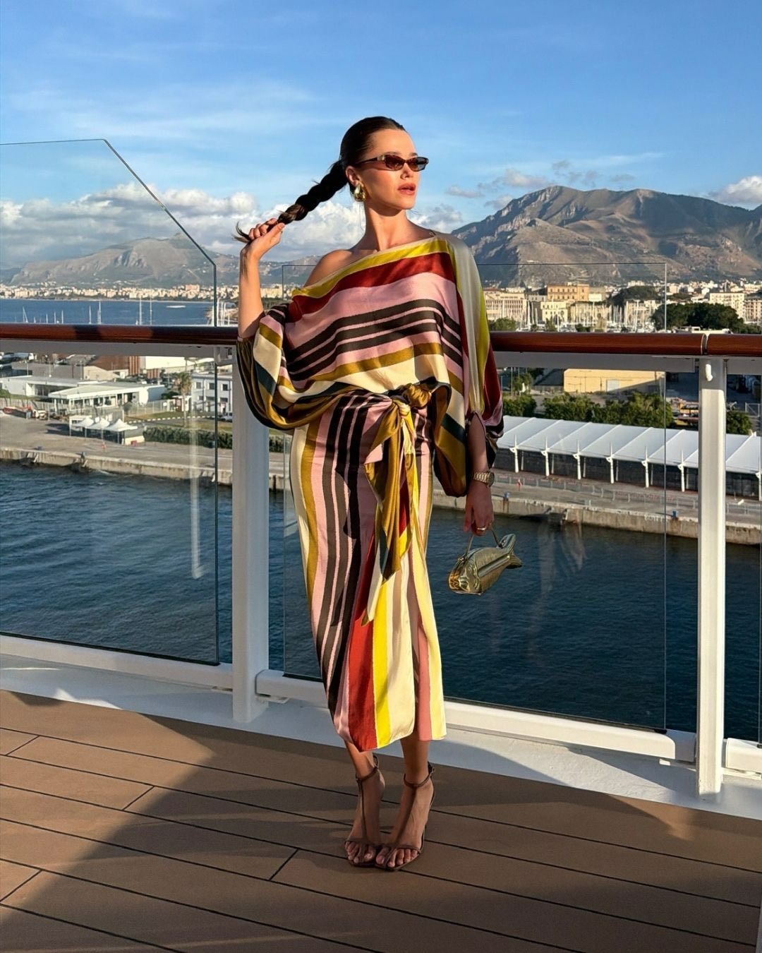 An image of a woman wearing striped dress for summer 2026