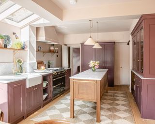 Cozy kitchen with purple cabinets