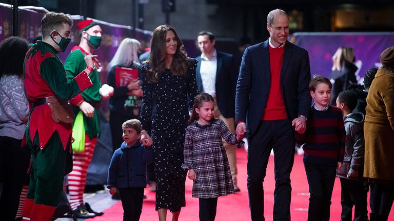 Prince William, Duke of Cambridge and Catherine, Duchess of Cambridge with their children, Prince Louis, Princess Charlotte and Prince George, attend a special pantomime performance