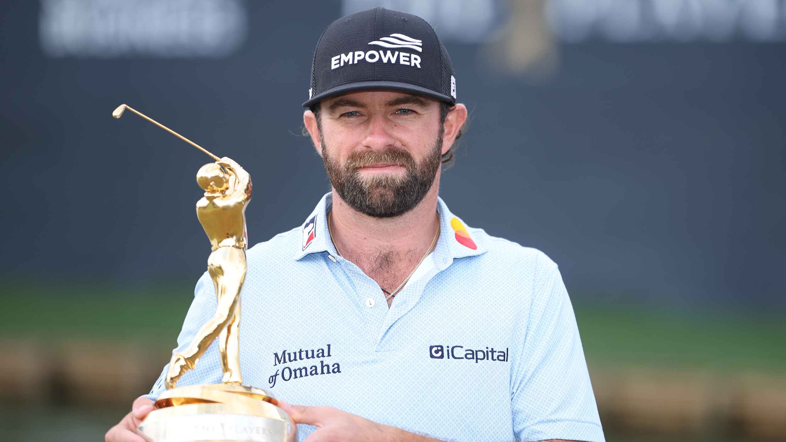 Cameron Young with The Players Championship trophy
