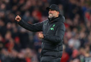 Liverpool manager Jurgen Klopp celebrates after the Premier League match between Liverpool FC and Luton Town at Anfield on February 21, 2024 in Liverpool, England.