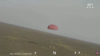 China's Shenzhou 13 space capsule carrying a crew of three lands safely in