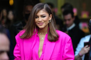 Zendaya in hot pink suit at Valentino show
