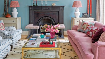 living room with large area rug, coffee table and two couches