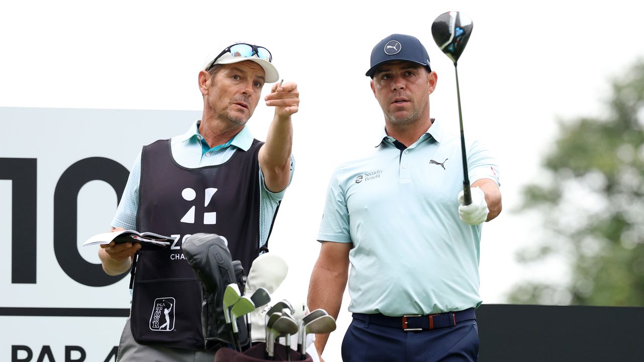 Gary Woodland (right) and his caddie, Brennan Little point something out in the distance at the 2024 Zozo Championship