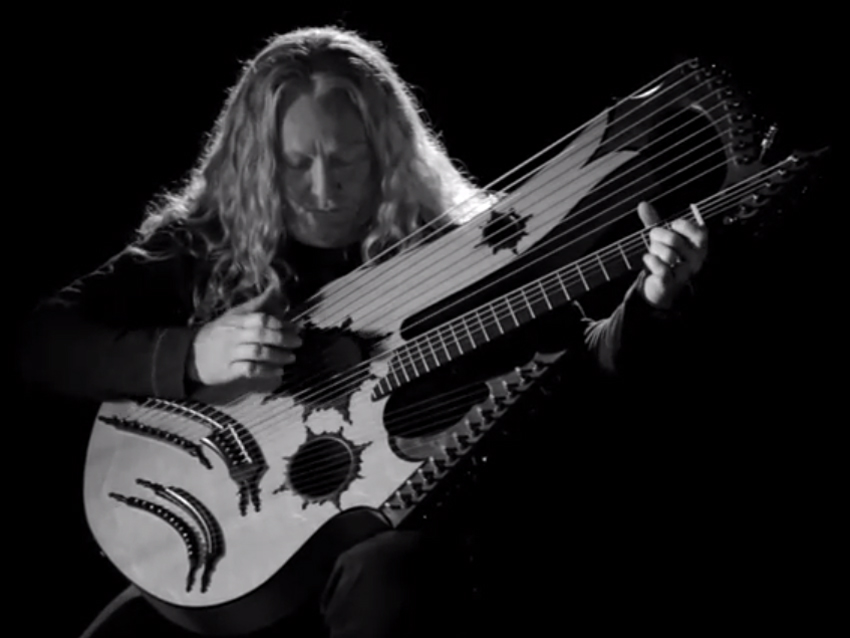 Who are those guitarists? Just one, actually - it&#039;s Keith Medley on his homemade 27-string model