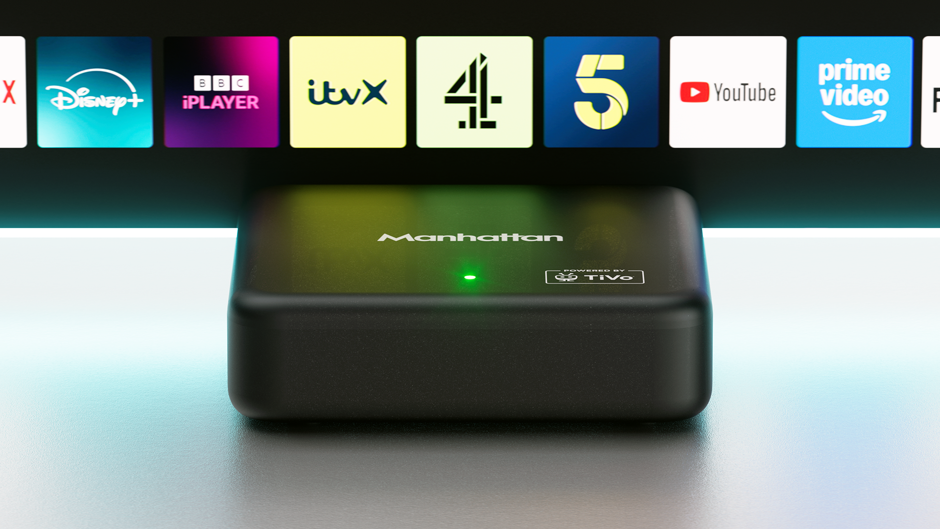 Manhatten TV Aero 4K TV Streamer with Freely &amp;ndash; box in lifestyle shot