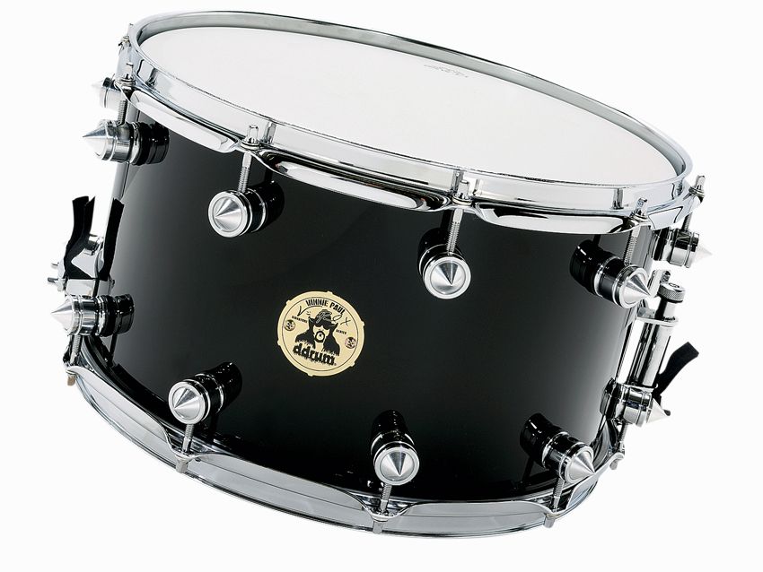 The mass of the spiked lugs calm the resonance of the drum