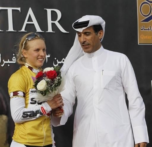 Rasa Leleivyte (Safi Pasta) accepts the prize of overall leader after stage 1 of the Ladies Tour of Qatar.