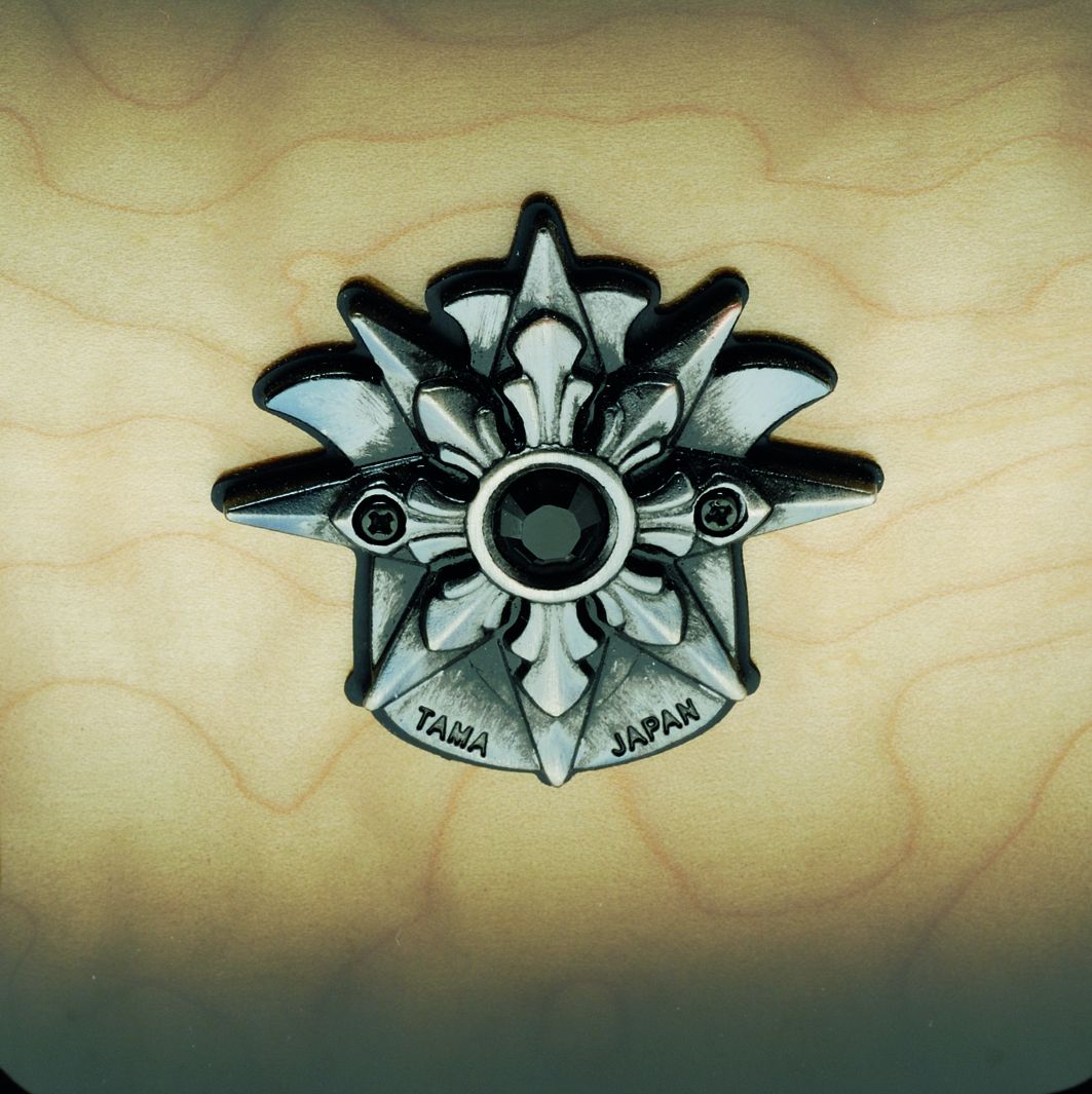 Each lug and badge has a small jet black Swarovski crystal inserted.