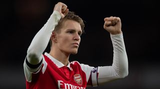 Arsenal captain Martin Odegaard celebrates after the Premier League match between Arsenal and West Ham United on 26 December, 2022 at the Emirates Stadium in London, United Kingdom.