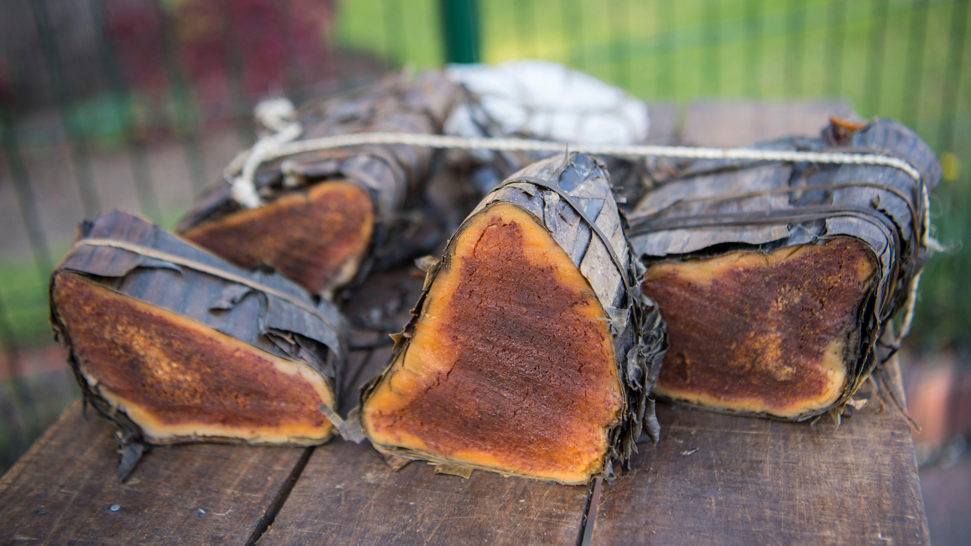 A sliced through look at Koba on a wooden table